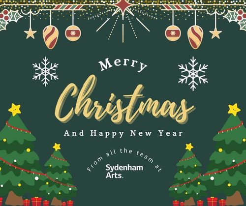 Christmas card with a green background and christmas trees around a message that says merry christmas and happy new year