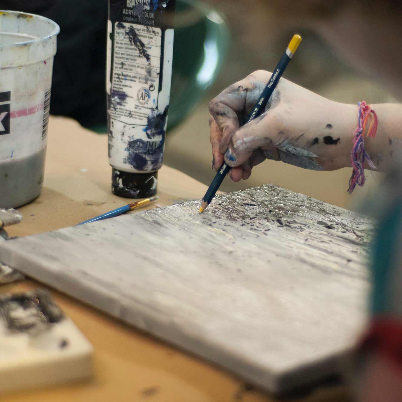 Young artist exploring art