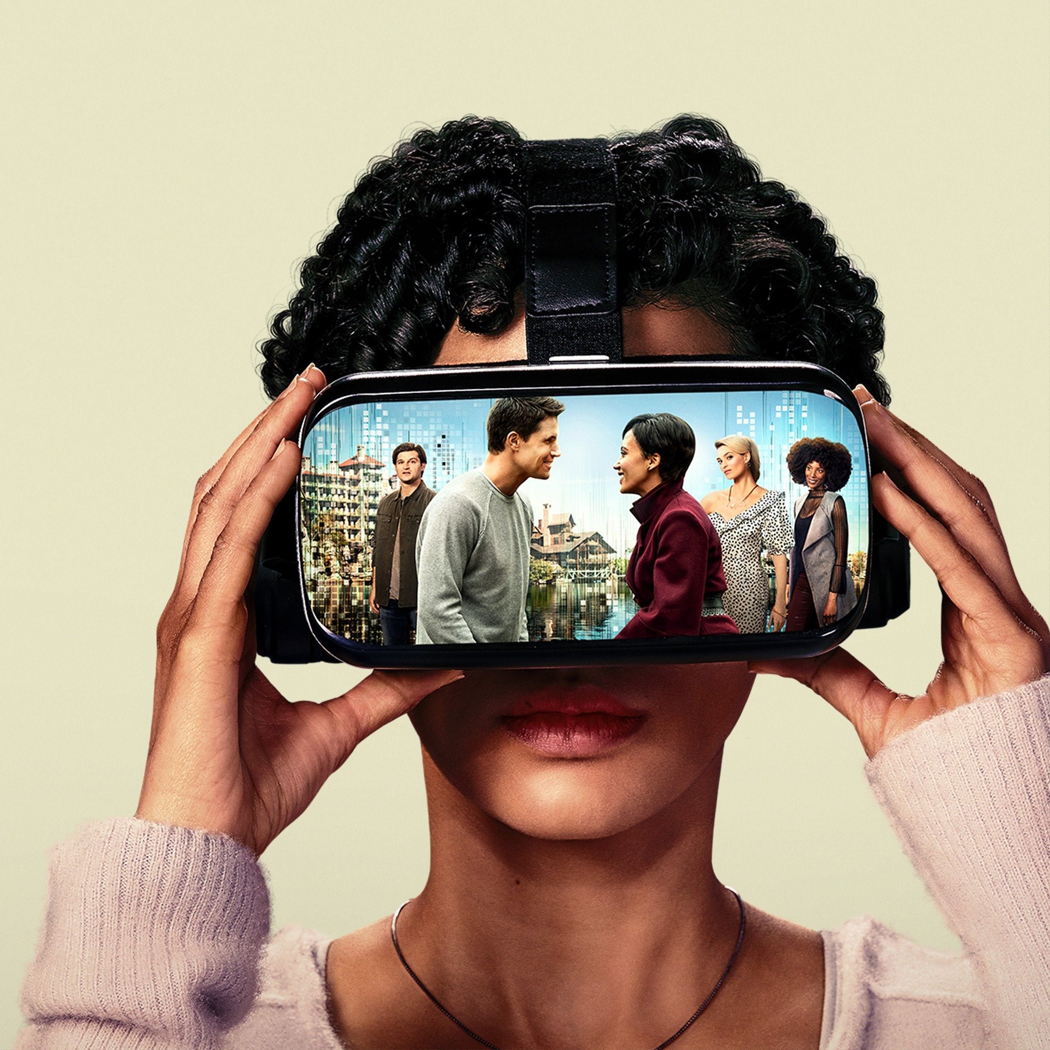 Image of a woman looking into a Virtual Reality Headset, which is showing a picture of two people meeting face to face.